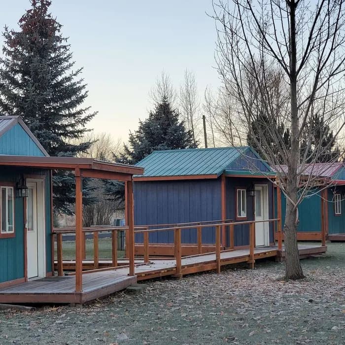 Blue cabins with wooden ramps at Scenic 6 RV Park in Potlatch, Idaho