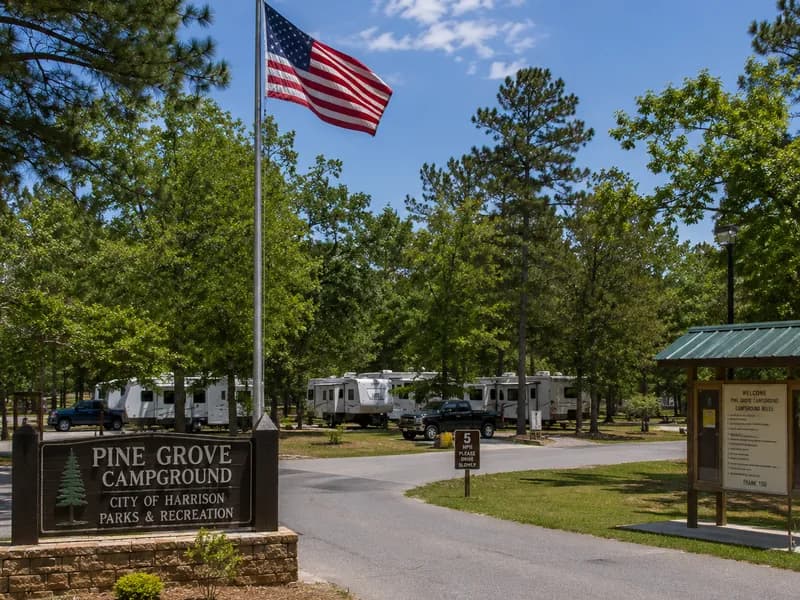 Entrance sign and US flag at a municipal Parks & Recreation campground