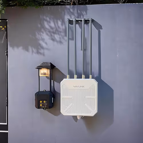 A white wall-mounted outdoor repeater