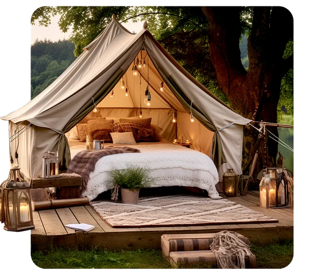 Lit bell tent on a wooden deck at dusk