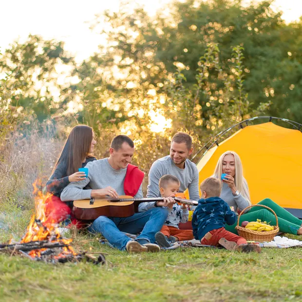 Group of campers gathered at a campground